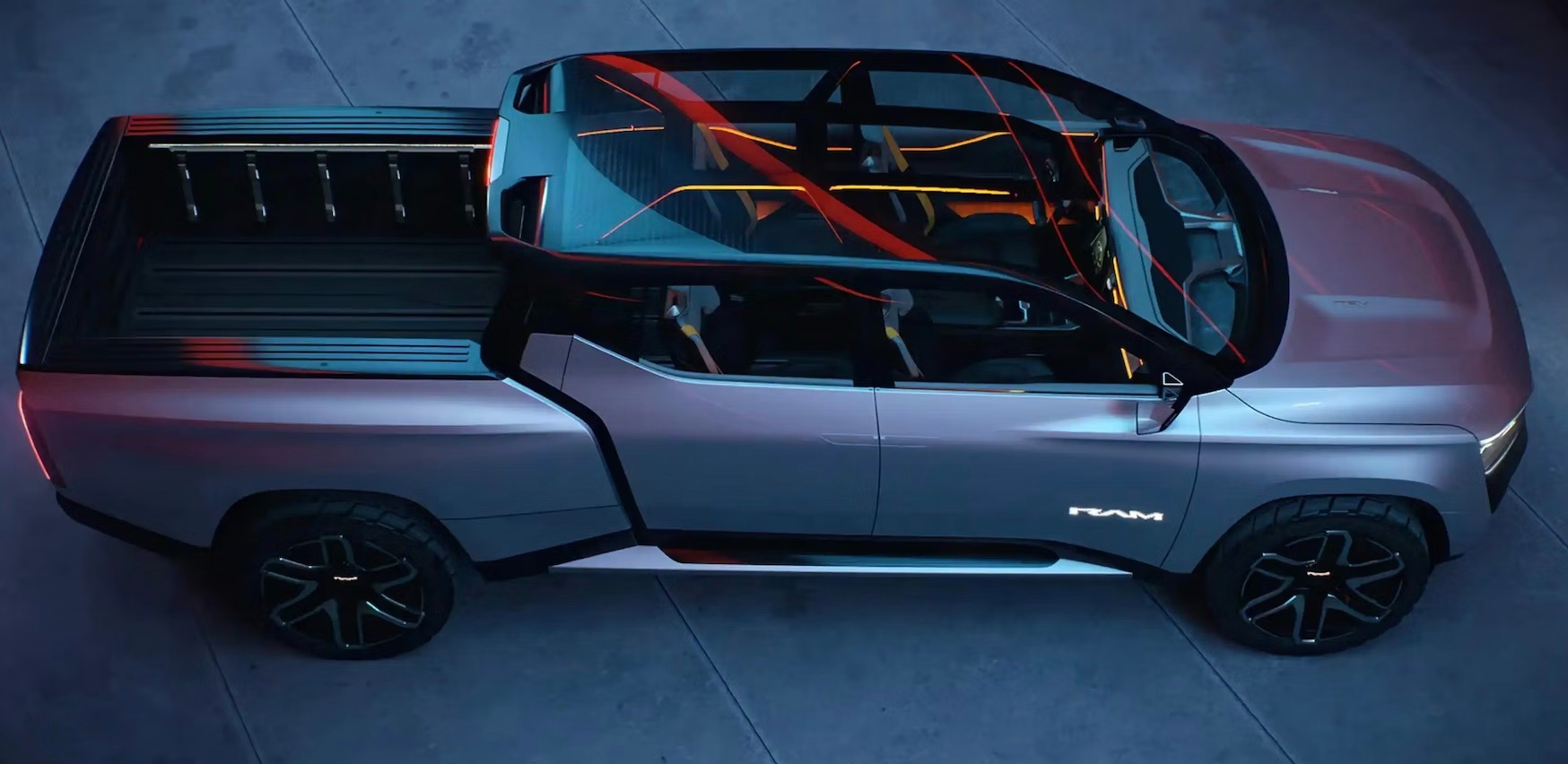 The electric Ram Revolution concept unveiled at CES last month looks much different from the Ram REV pickup revealed last Sunday during Super Bowl LVII.
