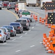 cars and trucks stuck in traffic