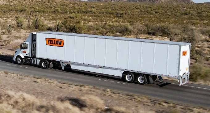 Yellow semi truck and trailer