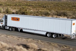 Yellow semi truck and trailer