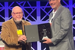 Duane Tegels, product marketing manager for Volvo Powertrain, accepts the Truck Writers’ Jim Winsor Technical Achievement Award