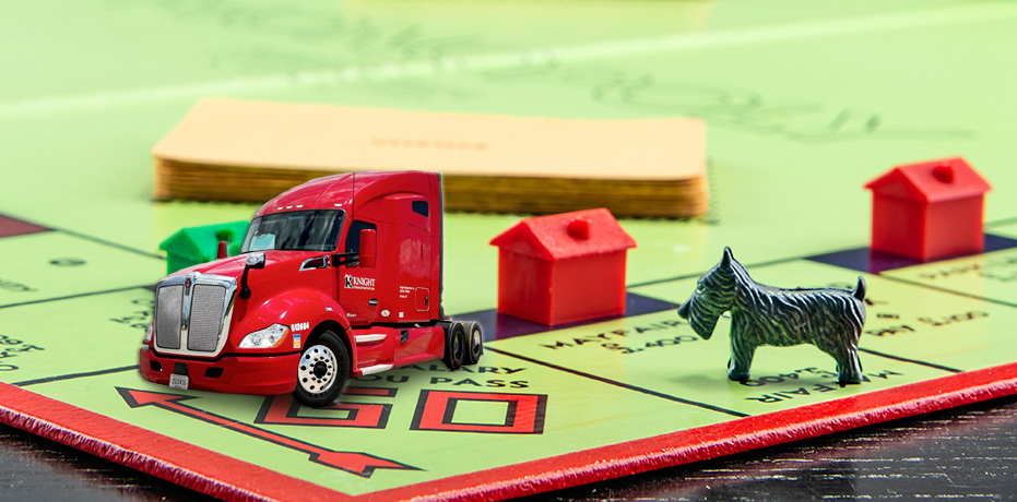 Knight truck on a Monopoly board