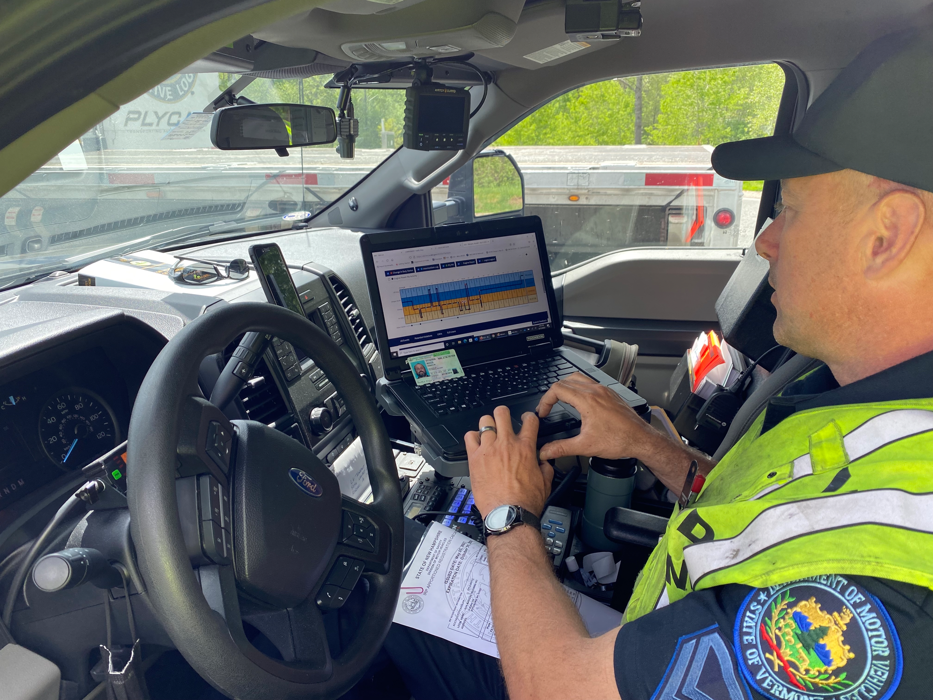Officer checking ELD logs