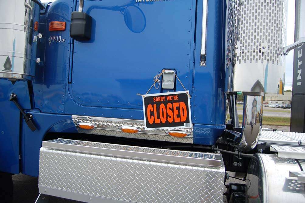 truck with closed sign on door