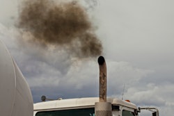 Truck blowing black smoke from exhaust