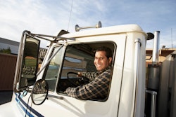 Truck driver smiling