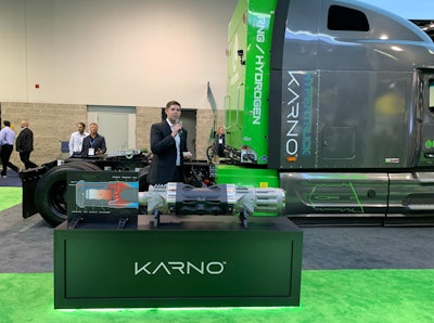 Hyliion CEO and founder Thomas Healy speaking in front of a Hyliion Karno truck