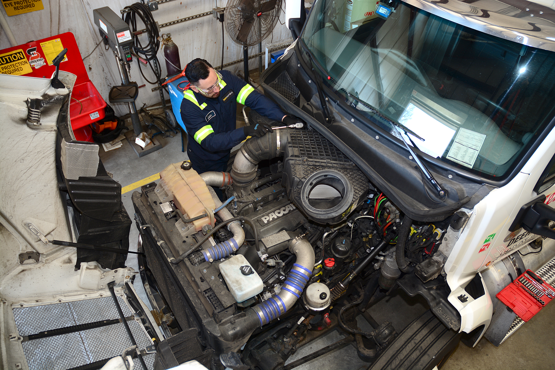 mechanic working on a truck