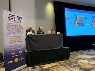 NACFE executive director Mike Roeth shares a laugh with Amanda Devoe, fleet sustainability and technology director at Frito-Lay North America and Brady Matoian, CEO of OK Produce in Fresno, Calif.