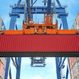 Shipping container on a crane