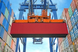 Shipping container on a crane