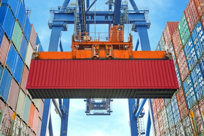 Shipping container on a crane