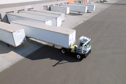 Outrider autonomous yard tractor backing into dock