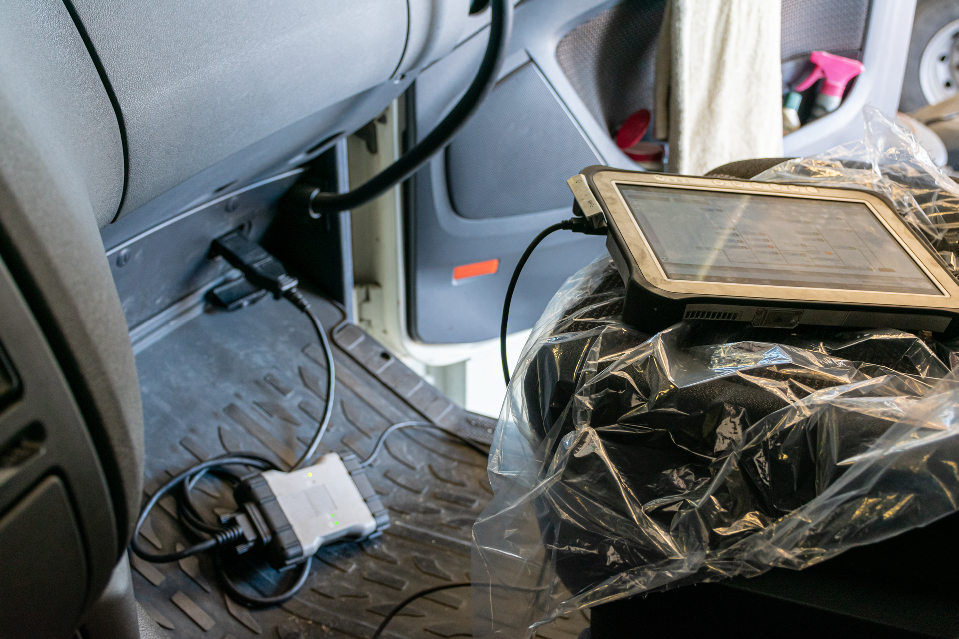 Tablet plugged into a data port