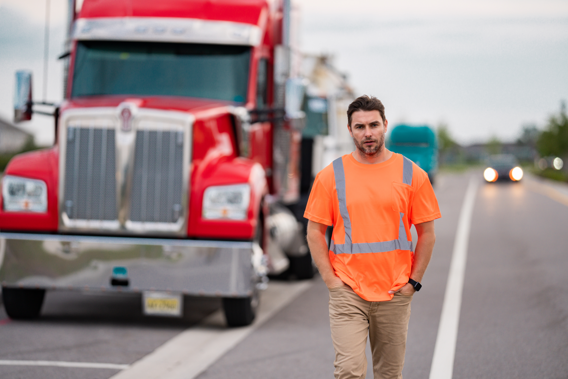 Trucker in a safety vest walking