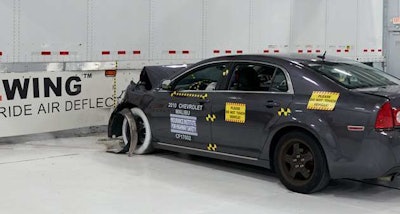 Passenger car crash test into trailer with side underride guards