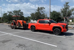 Never know where life will take you like doing a tow test with an orange 2023 Toyota Tundra and an orange Kubota tractor. Shortly after taking this a photo a guy stopped in his Ford F-150 and said Kubota orange was a close match to Toyota's solar octane. Have to admit the two look good together and got plenty of looks going down the road.