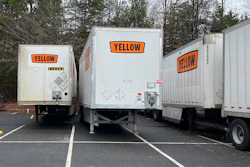 Yellow trailers in a lot