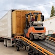 forklift loading a trailer