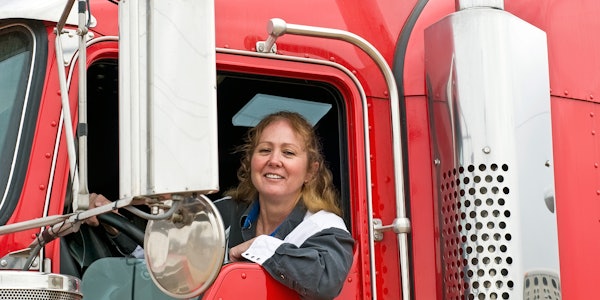 smiling female truck driver