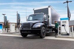 driving charging an electric Freightliner