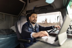 truck driver using a tablet
