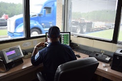 Inspection officer screening trucks