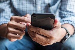 person using their cell phone