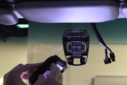 A technician installs a Bendix ADAS camera in a vehicle.