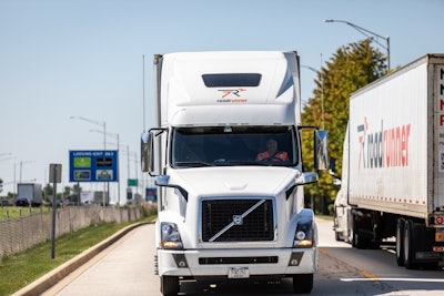 Roadrunner trucks passing on road