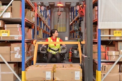 woman picking in a warehouse