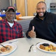 ACT Life Coach Dre Carnegie (right) is a familiar face in the carrier's cafe, which is located close to where drivers enter the building.