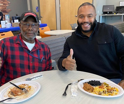 ACT Life Coach Dre Carnegie (right) is a familiar face in the carrier's cafe, which is located close to where drivers enter the building.