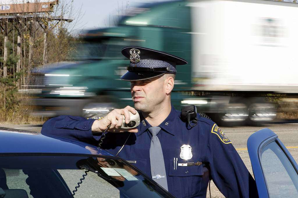 police with truck in background