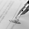 Pen signing a contract