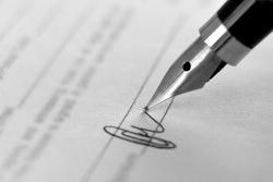 Pen signing a contract