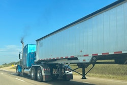 truck on highway with emissions
