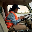Woman Truck Driver On Phone