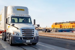 J.B. Hunt truck with train