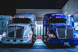 Swift trucks waiting at a dock