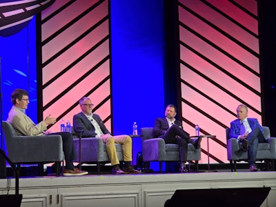 Joey Hogan, president of Covenant Logistics Group, Mark Rourke, president and CEO of Schneider National, Jim Richards, president and CEO of KLLM Transport Services, and Murray Mullen, chair, senior executive office and president of Mullen Group, at a leadership panel at the Truckload Carriers Association annual convention in Nashville.