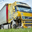 Volvo truck with front end damage