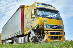 Volvo truck with front end damage