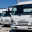 Isuzu trucks in a line