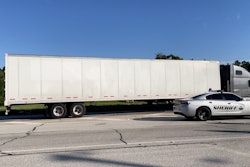 semi truck and police car