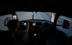 driver inside a truck cab