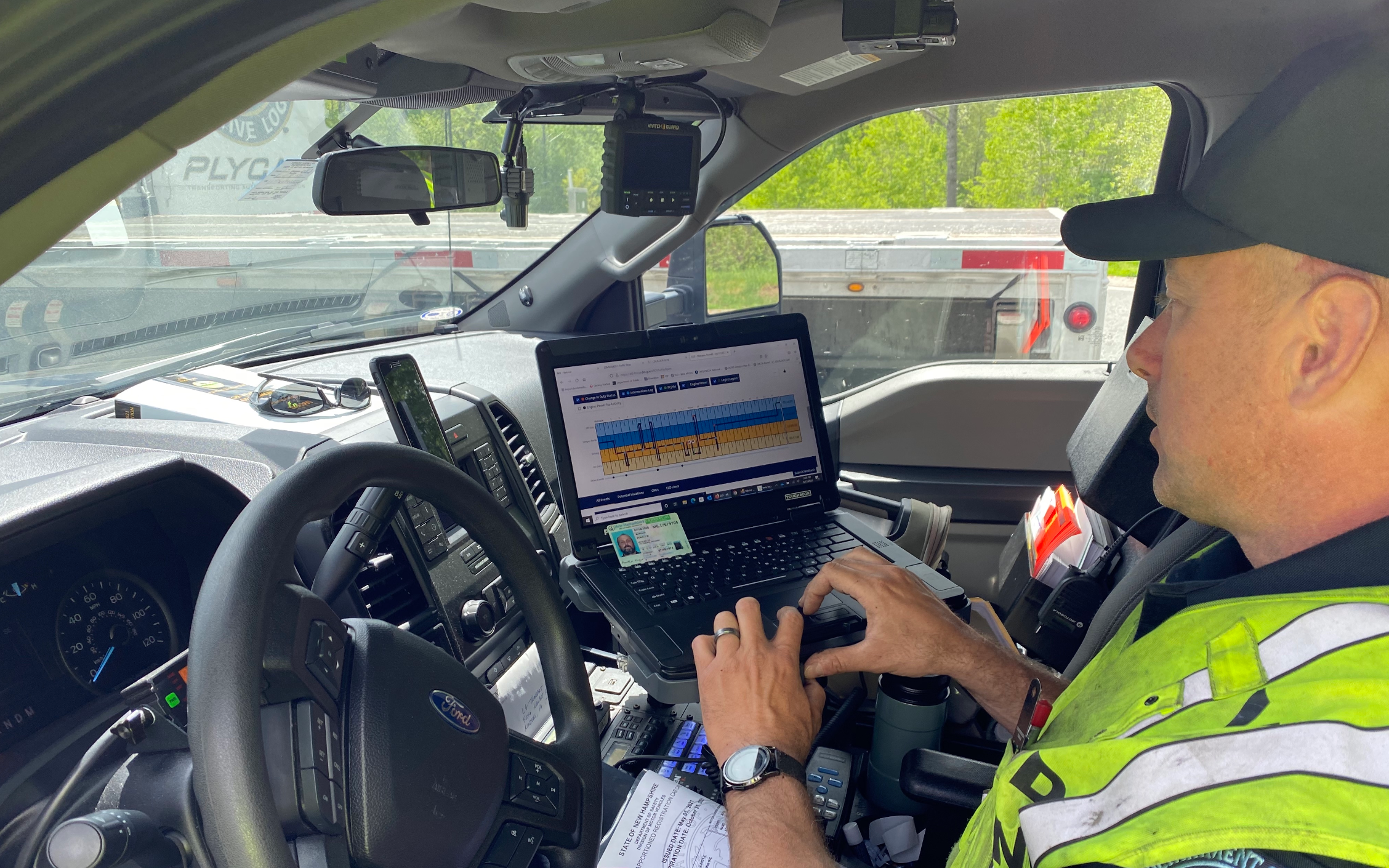 Officer checking logs