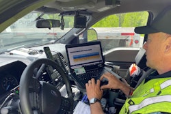 Officer checking logs