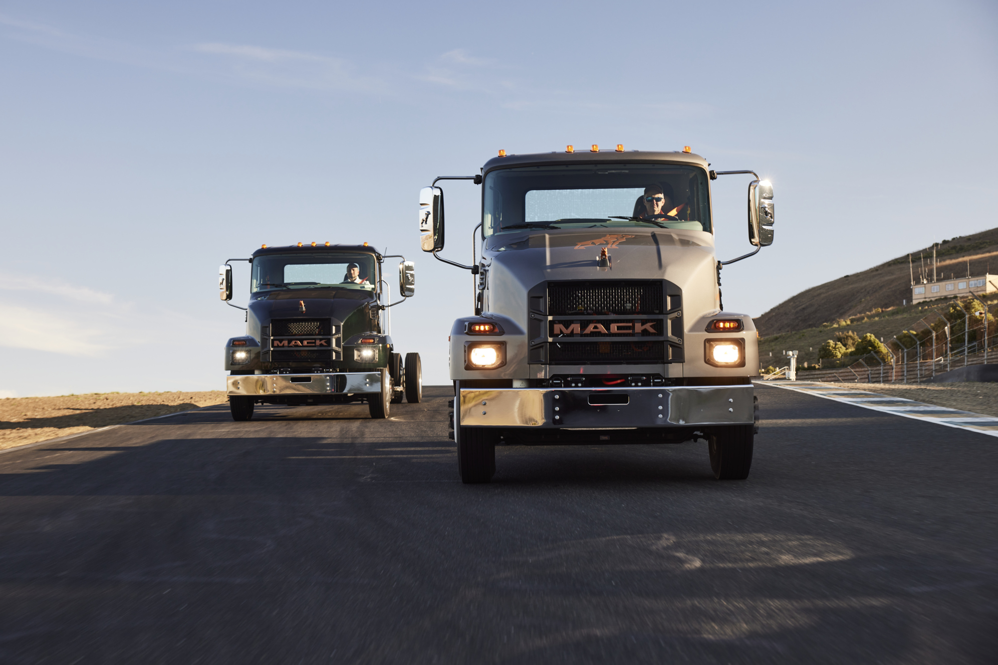 Mack MD electric trucks on the track