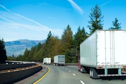 Trio of trailers on highway